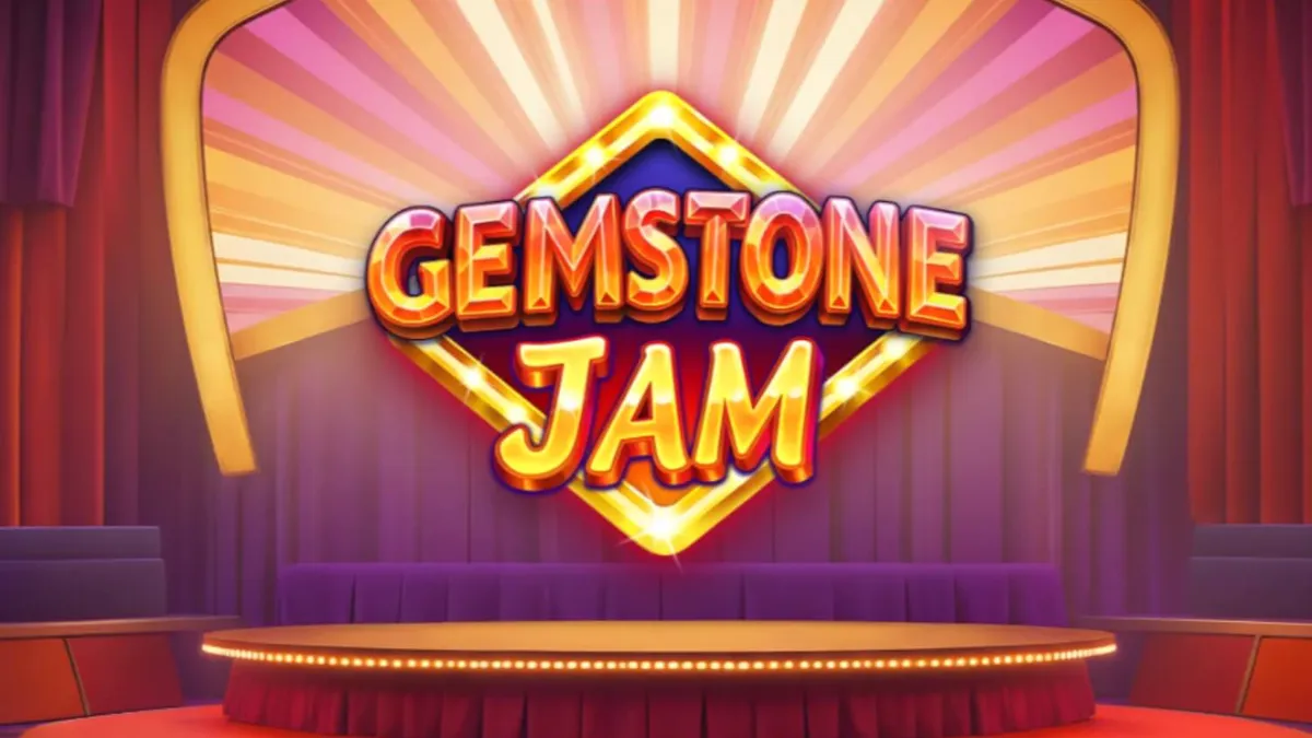Tampilan visual slot Gemstone Jam dengan desain panggung TV yang mewah dan simbol klasik yang berkilau.